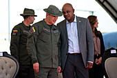 Colombia's national police director General William Rene Salamanca (L) speaks with Colombia's ambassador in the United States Luis Gilberto Murillo (R) during an event at the CATAM - Airbase in Bogota, where the United States of America embassy in Colombia gave 3 Lockheed Martin UH60 Black Hawks to improve the antinarcotics operations, on September 27, 2023.\n