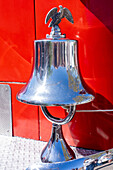 Detail of a 1948 Series 700 American LaFrance fire engine pumper truck in a car show in Moab, Utah.\n