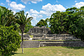 Structure A-13 in Plaza A-2 in the foreground with Structure A-11 behind in the Xunantunich Archeological Reserve in Belize.\n