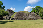 Structure A-1 facing Plaza A-2, with El Castillo behind in the Mayan ruins in the Xunantunich Archeological Reserve in Belize.\n