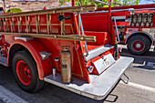 Detail of a 1948 Series 700 American LaFrance fire engine pumper truck in a car show in Moab, Utah.\n