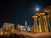 The Luxor Temple at night, under a full moon, constructed approximately 1400 BCE, UNESCO World Heritage Site, Luxor, Thebes, Egypt, North Africa, Africa\n