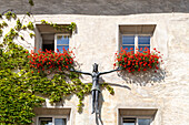 Sculpture of a man with outstretched arms, Brixen, Sudtirol (South Tyrol) (Province of Bolzano), Italy, Europe\n