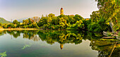 View of church reflecting in Karavomilos Lake in Sami, Sami, Kefalonia, Ionian Islands, Greek Islands, Greece, Europe\n