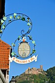 France, Haut Rhin, the Alsace Wine Route, Ribeauville, sign and Saint Ulrich castle\n