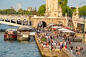 France, Paris, area listed as World Heritage by UNESCO, the Rives de Seine Park at Alexandre III bridge\n