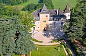 France, Lot, Lacave, castle of la Treyne, hotel of the company Relais et Chateaux on the edge of the Dordogne river (aerial vew)\n