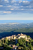 France, Alpes Maritimes, Parc Naturel Regional des Prealpes d'Azur, Gourdon, labeled Les Plus Beaux Villages de France, the coastline of the Côte d'Azur from d'Antibes to Cannes in the background\n