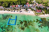 France, Caribbean, Lesser Antilles, Guadeloupe, Guadeloupe, Marie-Galante, Grand-Bourg, aerial view of the beach, its seawater pool and the lagoon\n