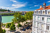 France, Rhone, Lyon, historical site listed as World Heritage by UNESCO, quay Victor Augagneur, Rhone River banks with a view of Hotel Dieu and Notre Dame de Fourviere Basilica\n