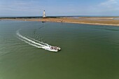 France, Gironde, Verdon-sur-Mer, rocky plateau of Cordouan, lighthouse of Cordouan, listed as World Heritage by UNESCO, visit of the lighthouse with transfer by boat and amphibious barge\n