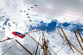 France, Seine Maritime, Rouen, Armada 2019, Patrouille Acrobatique de France (PAF) flying over the Kruzenshtern masts\n