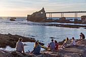 France, Pyrenees-Atlantiques, Biarritz, sunset at the Rocher de la Vierge\n