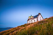 France, Finistere, Cap Sizun, Beuzec Cap Sizun, the tip and the Millier lighthouse in the evening\n