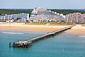 France, Vendee, St Jean de Monts, the beach and the wooden pier (aerial view)\n