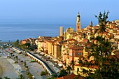 France, Alpes Maritimes, Cote d'Azur, Menton, the beach and the old town dominated by the Saint Michel Archange basilica\n