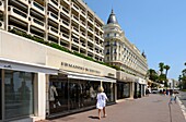 France, Alpes-Maritimes , Cannes, La Croisette, shops and Carlton hotel\n