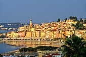 France, Alpes Maritimes, Cote d'Azur, Menton, the beach and the old town dominated by the Saint Michel Archange basilica\n