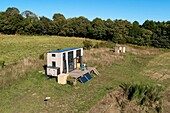 France, Finistere, Concarneau, experimentation of low-tech solutions in a tiny-house, two engineers (Pierre-Alain Leveque and Clement Chabot) built and live in a tiny-house (trailer-mounted micro-house) for test low-tech solutions (aerial view)\n
