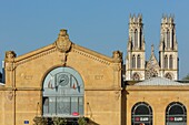 France, Meurthe et Moselle, Nancy, Nancy Ville train station built by architect Charles Francois Chatelain in 1850 and Saint Leon church in the background\n