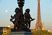 France, Paris, area listed as World Heritage by UNESCO, the Alexander III bridge and the Eiffel Tower on the background\n