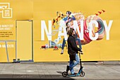 France, Meurthe et Moselle, street scene and mural in Rue Saint Jean (Saint Jean street)\n