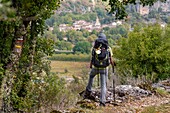 France, Lot, Geropark of Quercy, pilgim of Saint-Jacque to Compostelle on hiking trail GR65 under Lot river and valley, upper side of Vers village\n