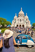 France, Paris, Butte Montmartre, 2cv car and the Sacre Coeur\n