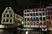 France, Bas Rhin, Strasbourg, old town listed as World Heritage by UNESCO, the Ill river, the Historical museum, video mapping on the facade, summer evening 2019\n