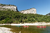 France, Ardeche, Sauze, Ardeche Gorges natural national reserve, tourist on the Ardeche river with kayaks between Gournier bivouac and Sauze\n