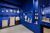 France, Gard, Nimes, Musee de la Romanite by architect Elizabeth de Portzamparc, exhibition of stone statues presenting the Roman religion\n