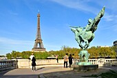 France, Paris, area listed as World Heritage by UNESCO, the banks of the Seine river, Bir Hakeim bridge, equestrian statue, symbol of Reviving France by sculptor Wederlink and Eiffel Tower\n
