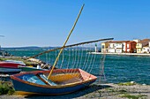 France, Herault, Sete, quarter of La Pointe Courte , colourful boat on a wharf\n