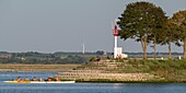 France, Somme, Somme Bay, Saint-Valery-sur-Somme, Canoe and kayak return from a walk in the channels in the salted meadows\n