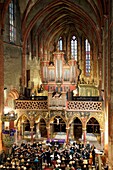 France, Bas Rhin, Strasbourg, old city listed as World Heritage by UNESCO, Saint Pierre le Jeune protestant church, jube of the 14th century surmounted of an organ Silberman (1780), Concert of the Jonas orchestra\n