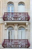 France, Meurthe et Moselle, Nancy, facade of an apartment building downtown and balcony\n