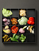 Tray with fresh and prepared vegetables