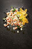 Ceviche mit Lachs und Jakobsmuscheln