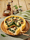Cheese and spinach quiche with a crispy rice base
