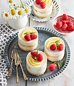 Rosemary mini cake with raspberries and honey cream