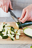 Courgette being diced