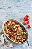 Vegan zucchini and tomato casserole with veggie mince