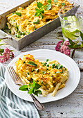 Baked pasta with peas and spinach