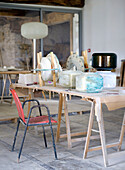 Work table in an artist's workshop for lamp design