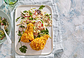 Crispy cornflake chicken drumsticks with coleslaw