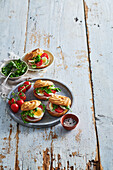 Choux pastry sandwiches with eggs and ham