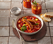 Tomato and pepper stew with sausage