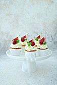 Vanilla cupcakes with mascarpone cream, raspberries and figs