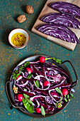 Red cabbage and radish salad with spinach