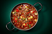 Beef goulash with potatoes and peppers